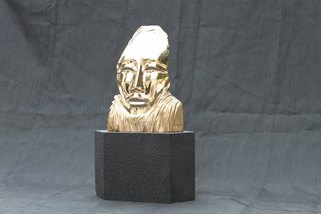 masque en bronze poli